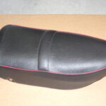SEAT - BLACK w/RED PIPING - LEIGHTON
