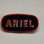 ACCESSORY: OVAL PATCH w/RED THREAD ON BLACK SILK - "ARIEL"