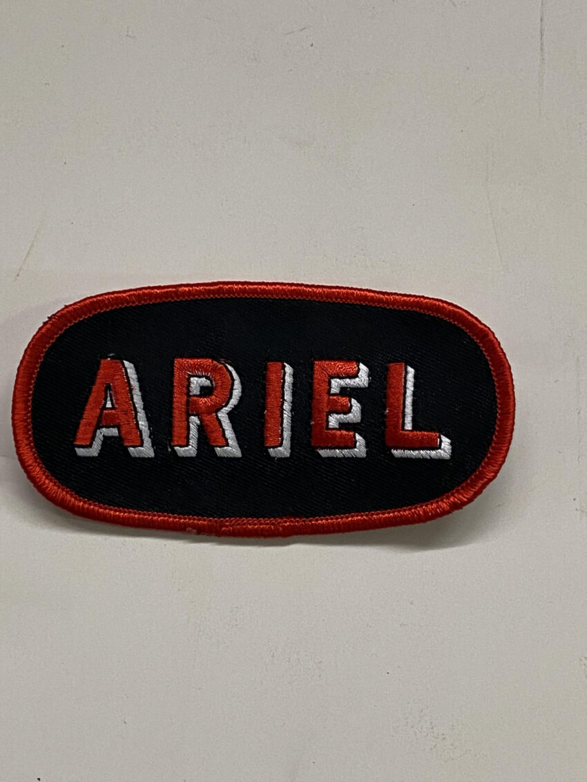 ACCESSORY: OVAL PATCH w/RED THREAD ON BLACK SILK - "ARIEL"